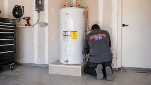Water heater pete tech installing a new electric Rudd 50gal water heater